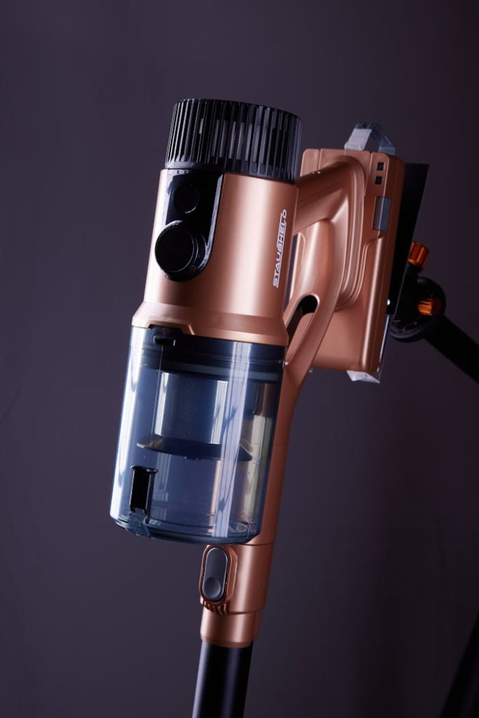 Elegant cordless vacuum cleaner with a metallic finish, perfect for modern homes.